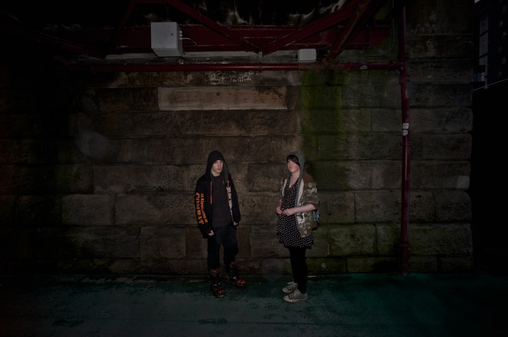 Boyfriend and girlfriend under bridge River Clyde